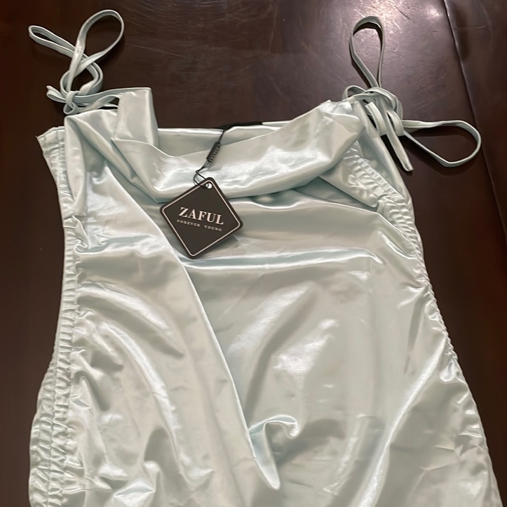 im selling this mint color silk dress.
